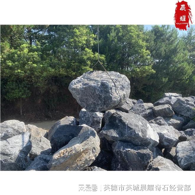 PG电子官方网站庭院枯山石风景石黑山石吨位批发清远园林石场(图2)